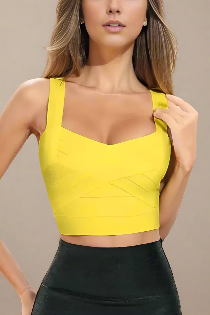 Woman wearing a figure flattering Jay Bandage Crop Top - Sun Yellow BODYCON COLLECTION