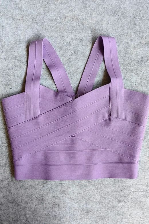 Woman wearing a figure flattering Jay Bandage Crop Top - Violet Purple BODYCON COLLECTION