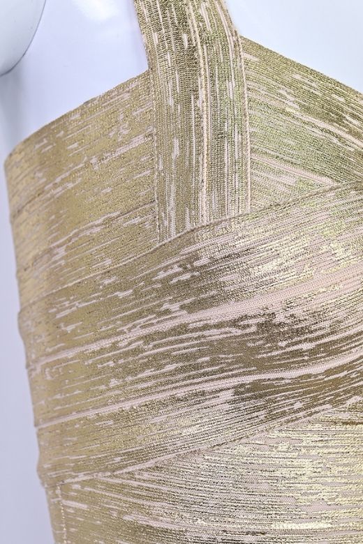 Woman wearing a figure flattering Jay Bandage Leather Crop Top - Gold BODYCON COLLECTION