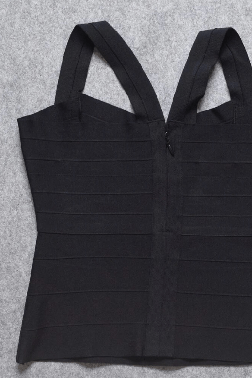 Woman wearing a figure flattering Jay Bandage Top - Classic Black BODYCON COLLECTION