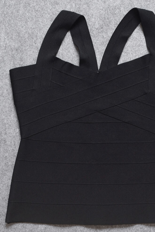 Woman wearing a figure flattering Jay Bandage Top - Classic Black BODYCON COLLECTION