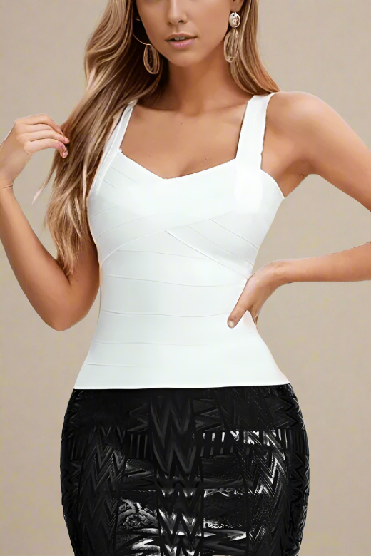 Woman wearing a figure flattering Jay Bandage Top - Pearl White BODYCON COLLECTION
