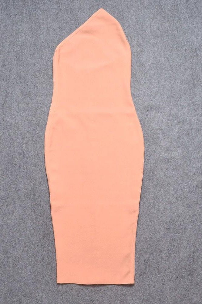 Woman wearing a figure flattering Joi Bodycon Midi Dress - Peach Bodycon Collection