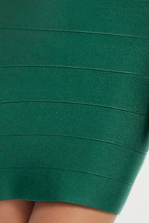 Woman wearing a figure flattering Josie Bandage V Neck Mini Dress - Emerald Green BODYCON COLLECTION