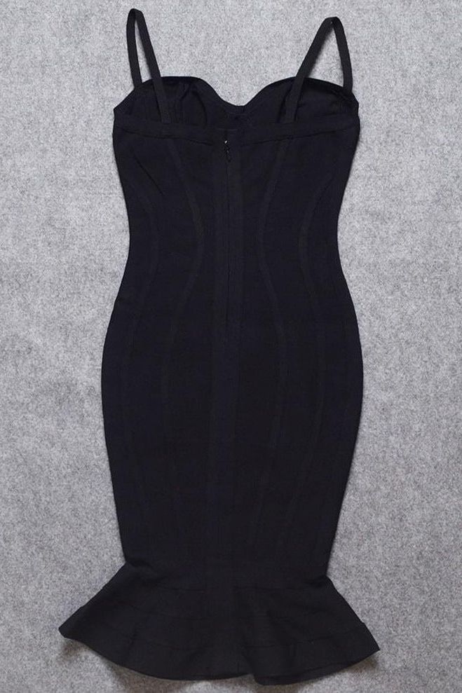 Woman wearing a figure flattering Joy Bandage Midi Dress - Classic Black Bodycon Collection