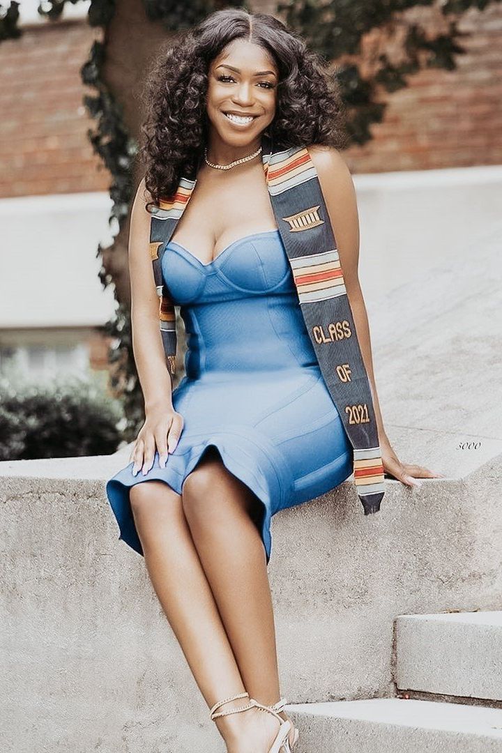 Woman wearing a figure flattering Joy Bandage Midi Dress - Royal Blue Bodycon Collection