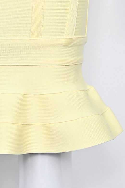 Woman wearing a figure flattering Joy Bandage Midi Dress - Sun Yellow Bodycon Collection
