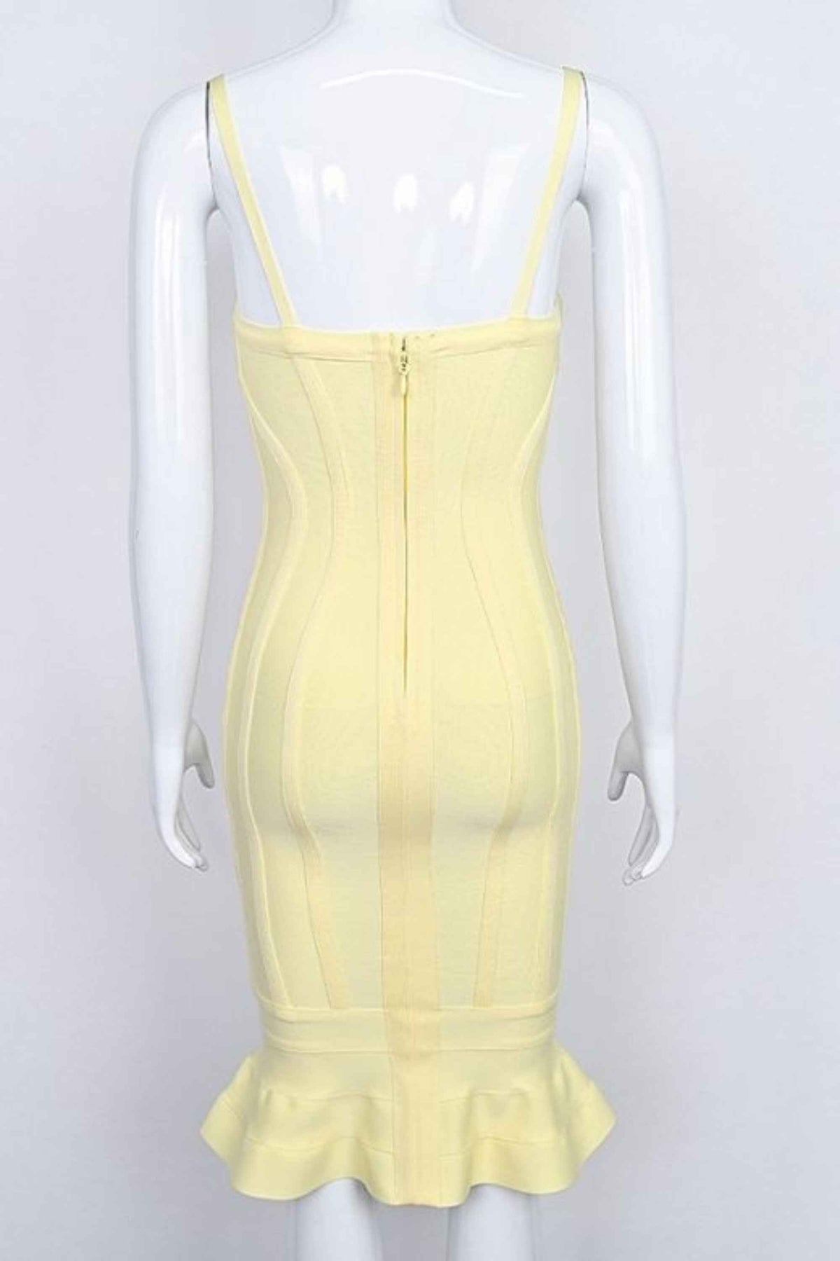 Woman wearing a figure flattering Joy Bandage Midi Dress - Sun Yellow Bodycon Collection