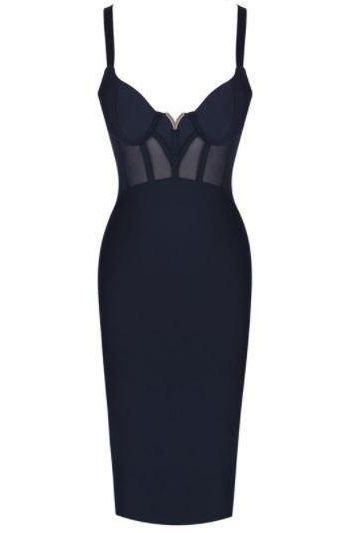 Woman wearing a figure flattering Juliette Bodycon Dress - Classic Black Bodycon Collection