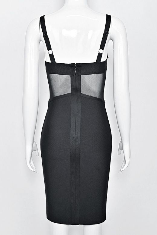 Woman wearing a figure flattering Juliette Bodycon Dress - Classic Black Bodycon Collection