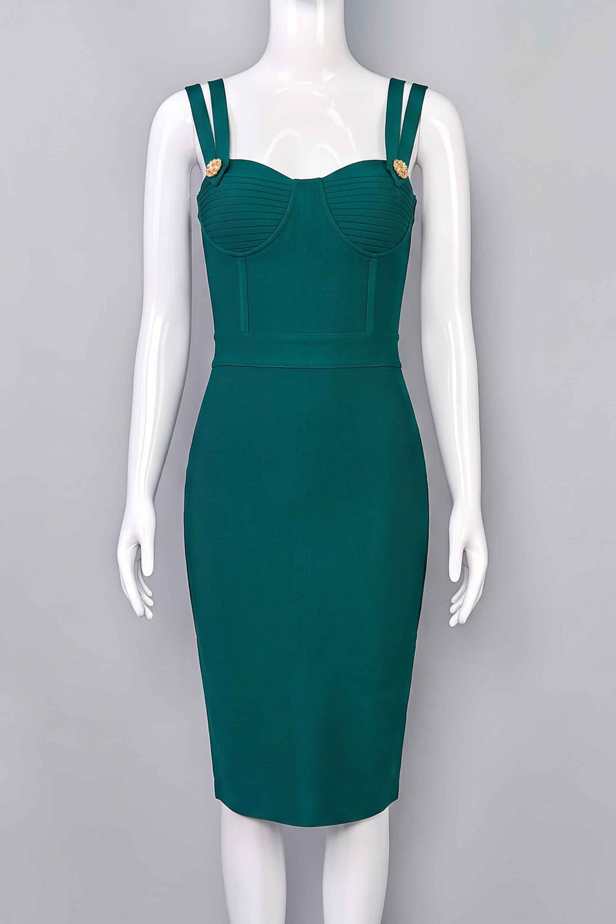 Woman wearing a figure flattering Kate Bandage Dress - Emerald Green Bodycon Collection