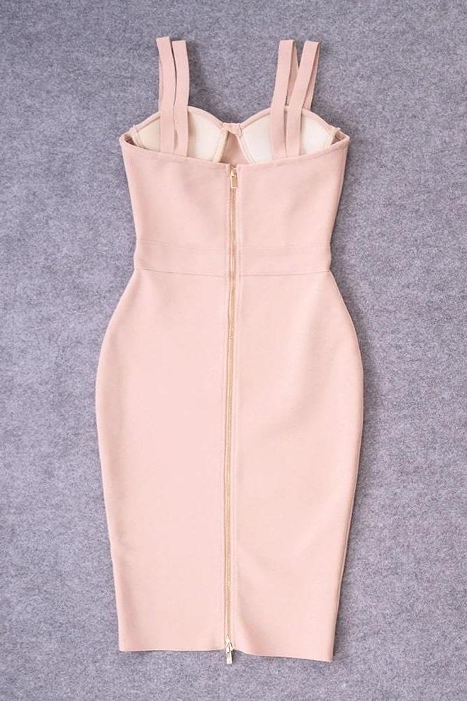Woman wearing a figure flattering Kate Bandage Dress - Nude Bodycon Collection