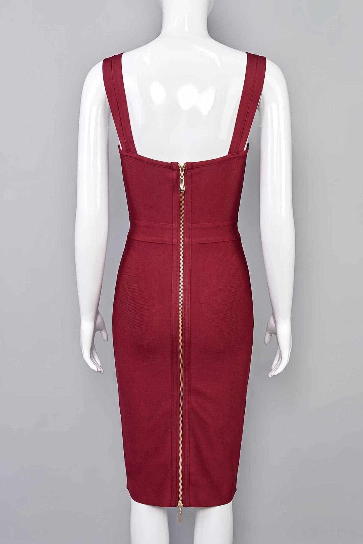 Woman wearing a figure flattering Kate Bandage Dress - Red Wine Bodycon Collection