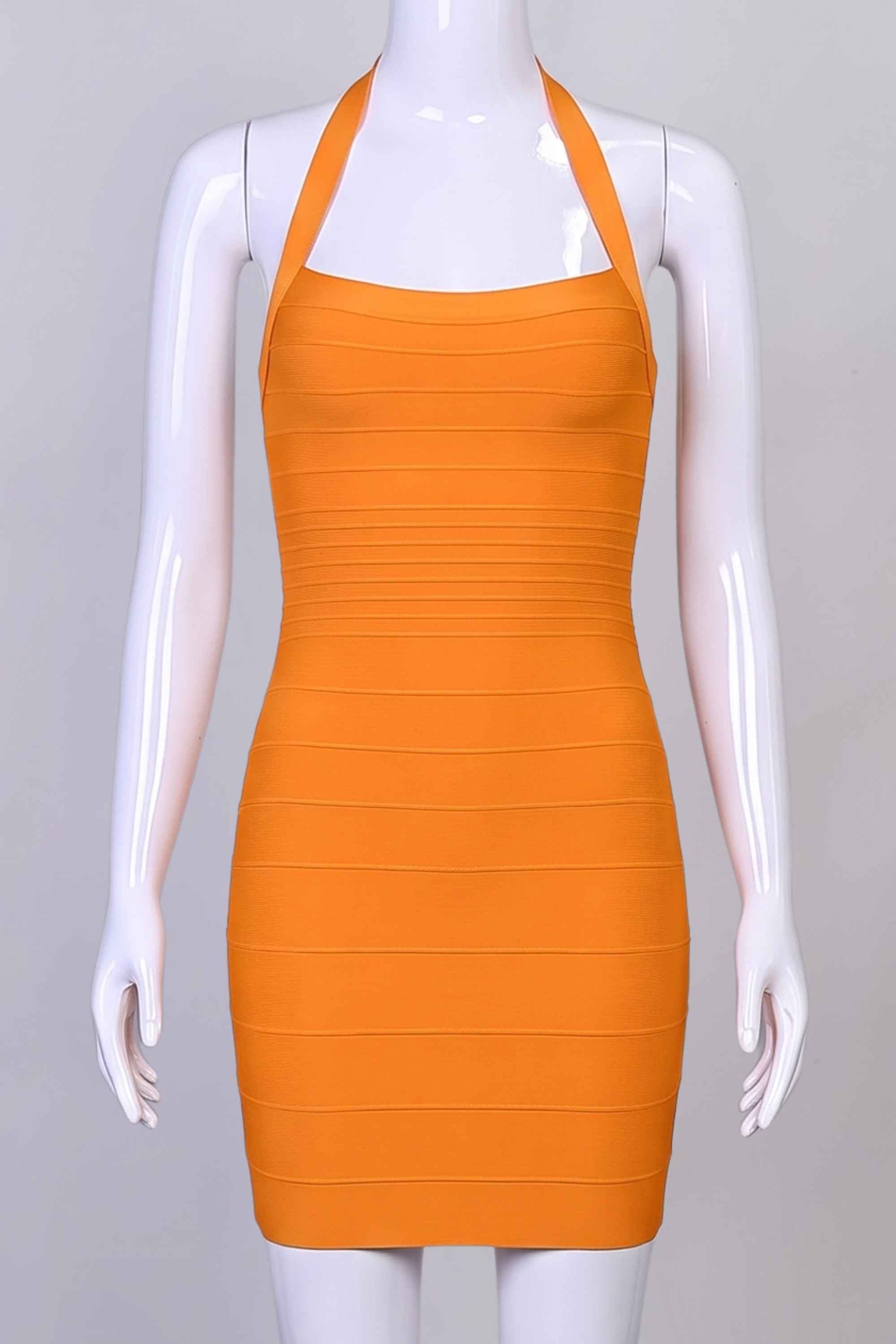 Woman wearing a figure flattering Kia Bandage Mini Dress - Apricot Orange BODYCON COLLECTION Pty Ltd