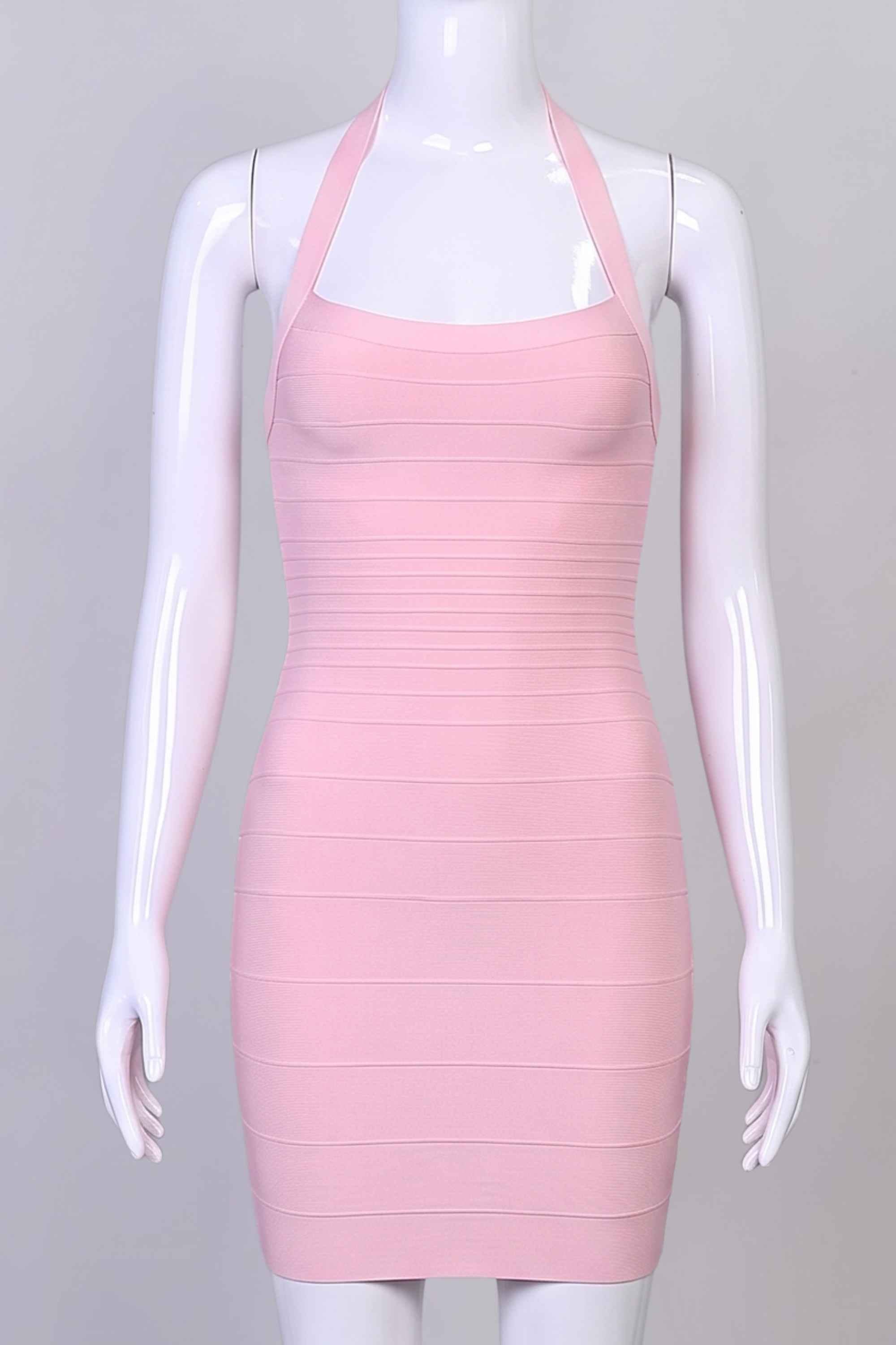 Woman wearing a figure flattering Kia Bandage Mini Dress - Dusty Pink BODYCON COLLECTION Pty Ltd
