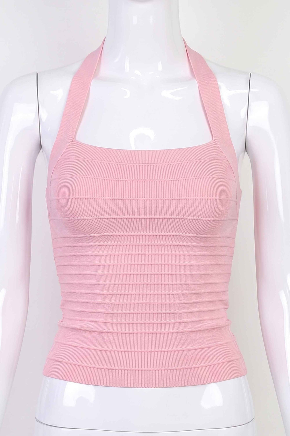 Woman wearing a figure flattering Kia Bandage Top - Dusty Pink BODYCON COLLECTION Pty Ltd