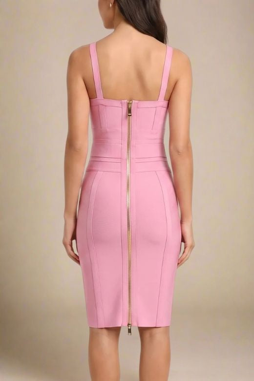 Woman wearing a figure flattering Kit Bandage Dress - Blush Pink Bodycon Collection