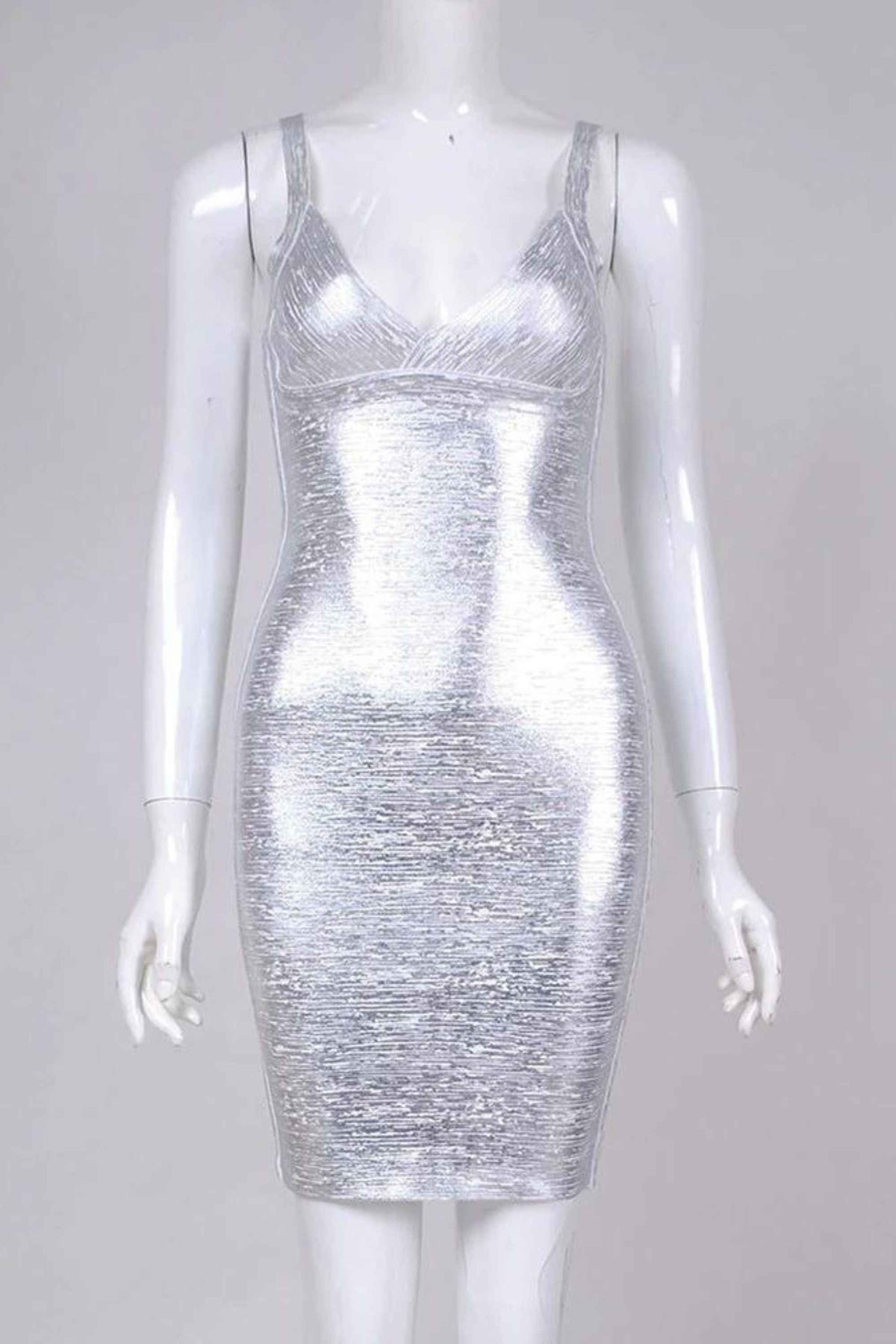 Woman wearing a figure flattering Kit Bandage Dress - Silver Bodycon Collection