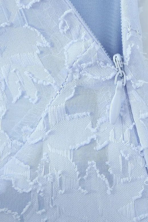 Woman wearing a figure flattering Kora Bodycon Maxi Dress - Baby Blue BODYCON COLLECTION