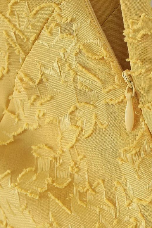 Woman wearing a figure flattering Kora Bodycon Maxi Dress - Lemon Yellow BODYCON COLLECTION