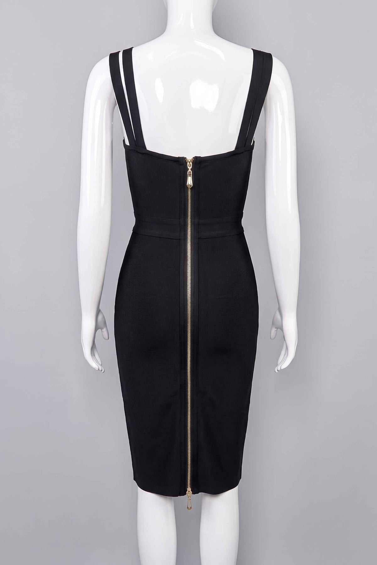 Woman wearing a figure flattering Kate Bandage Dress - Classic Black Bodycon Collection