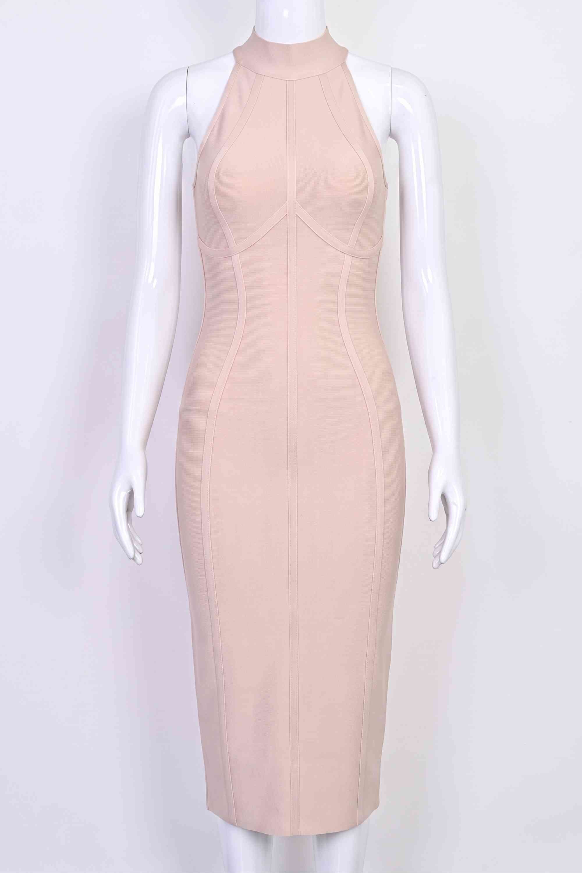 Woman wearing a figure flattering Lea Bandage Midi Dress - Beige Bodycon Collection