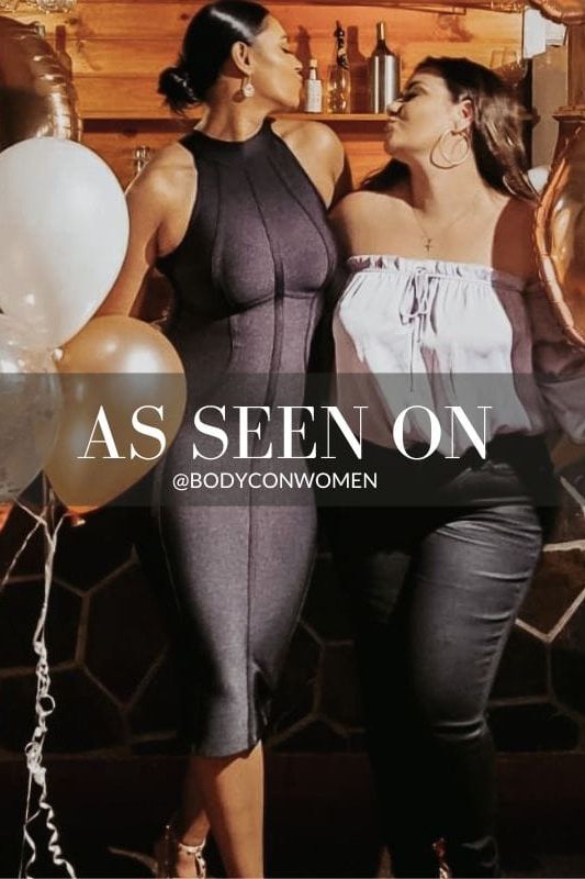 Woman wearing a figure flattering Lea Bandage Midi Dress - Classic Black Bodycon Collection