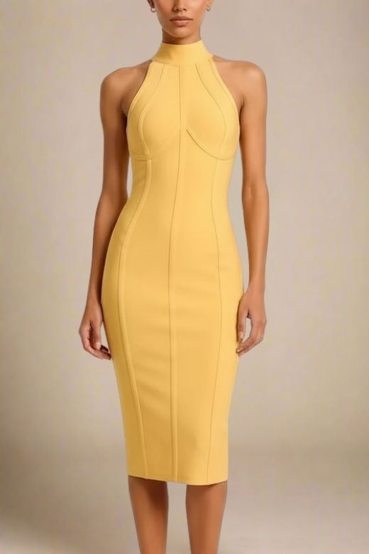 Woman wearing a figure flattering Lea Bandage Midi Dress - Mustard Yellow Bodycon Collection