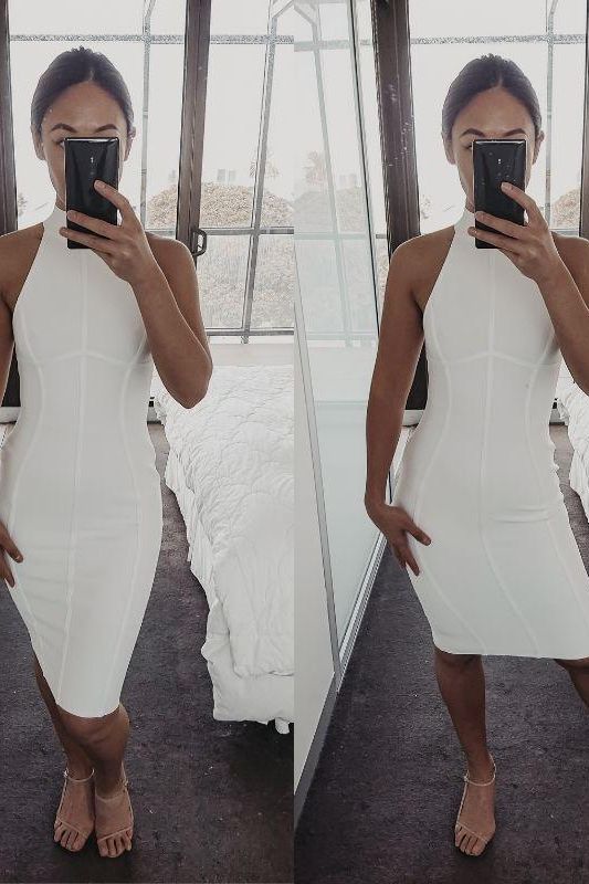 Woman wearing a figure flattering Lea Bandage Midi Dress - Pearl White Bodycon Collection