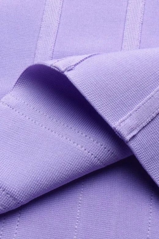 Woman wearing a figure flattering Leah Bodycon Dress - Violet Purple Bodycon Collection