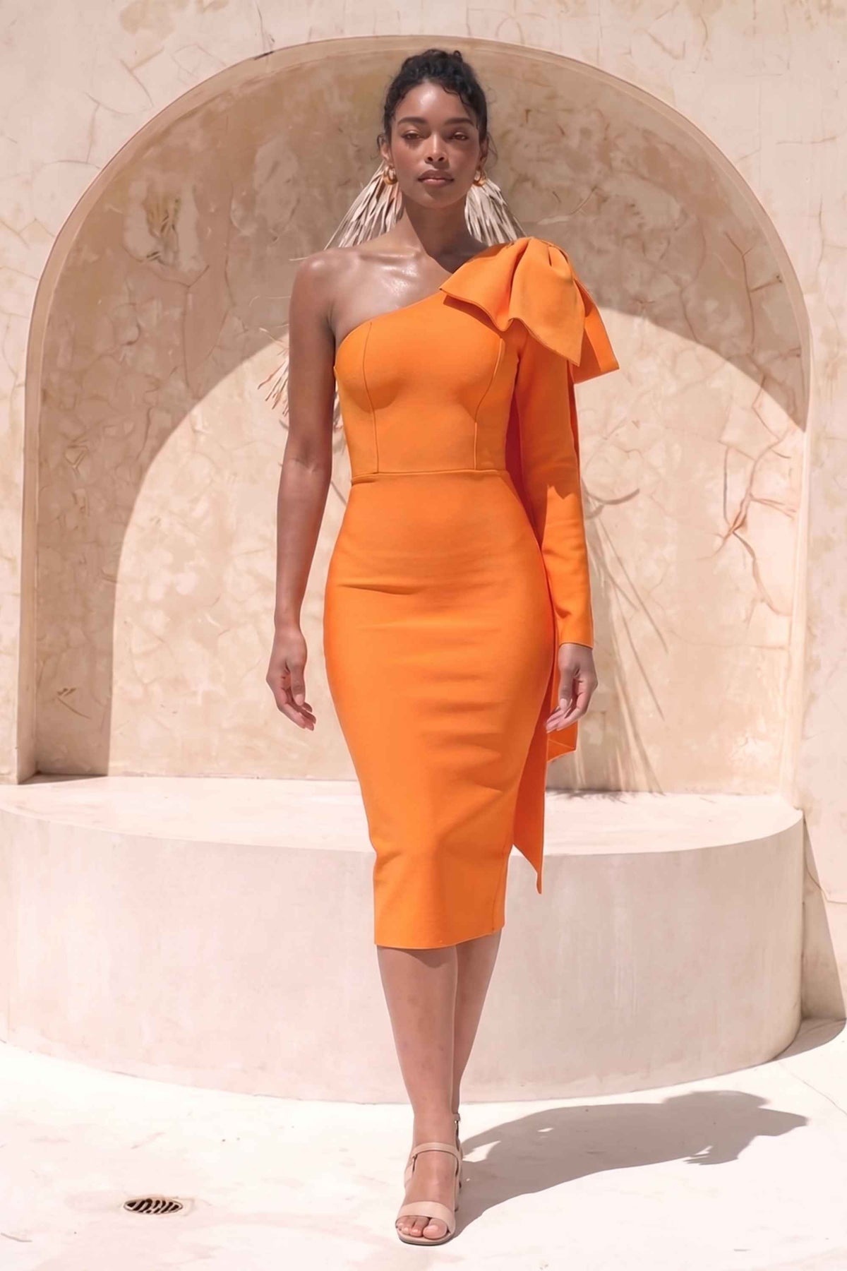 Woman wearing a figure flattering Lela Long Sleeve Bandage Midi Dress - Apricot Orange BODYCON COLLECTION