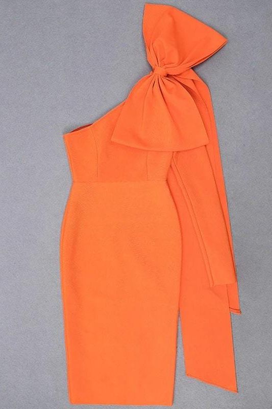 Woman wearing a figure flattering Lela Long Sleeve Bandage Midi Dress - Apricot Orange BODYCON COLLECTION