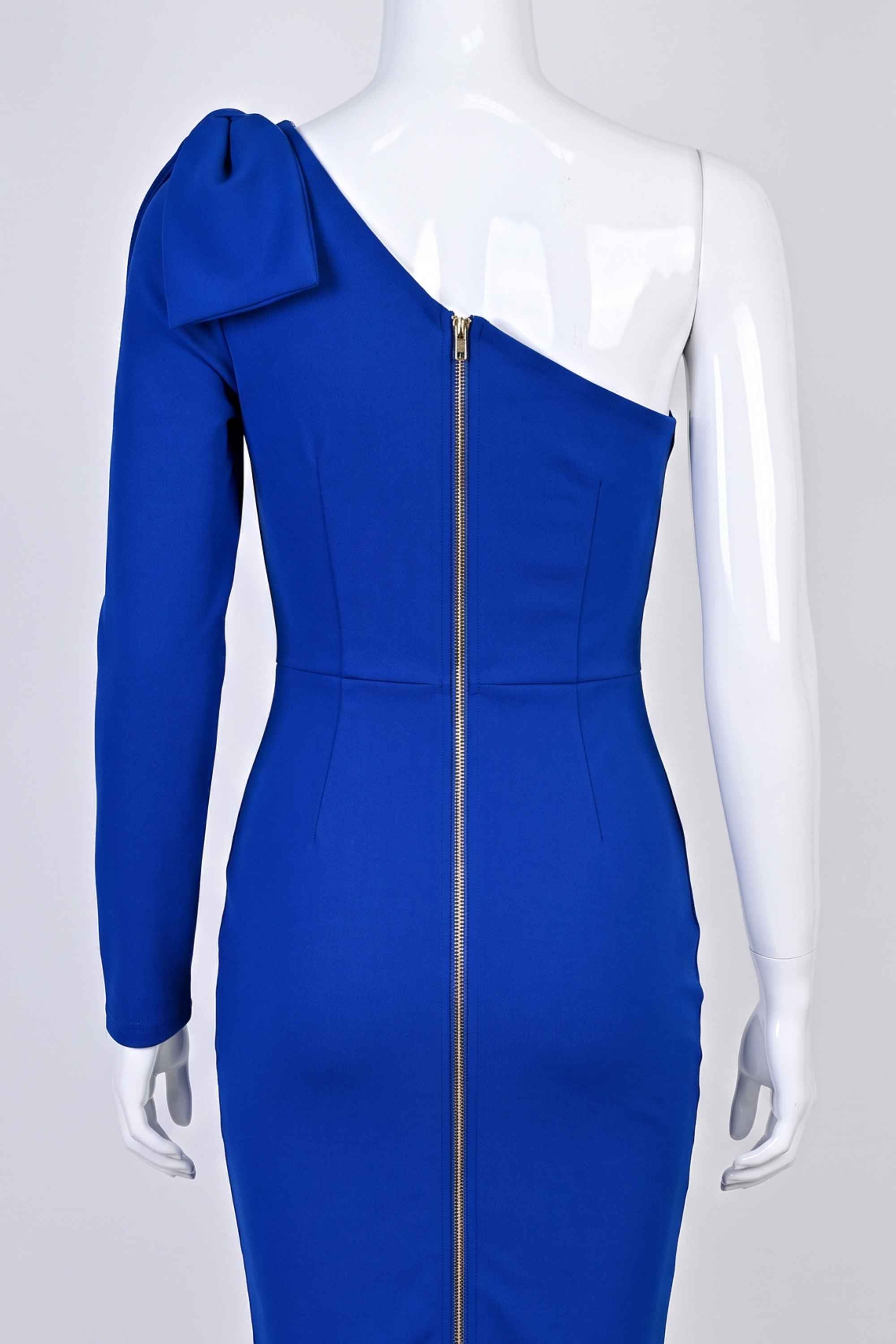 Woman wearing a figure flattering Lela Long Sleeve Bandage Midi Dress - Royal Blue BODYCON COLLECTION
