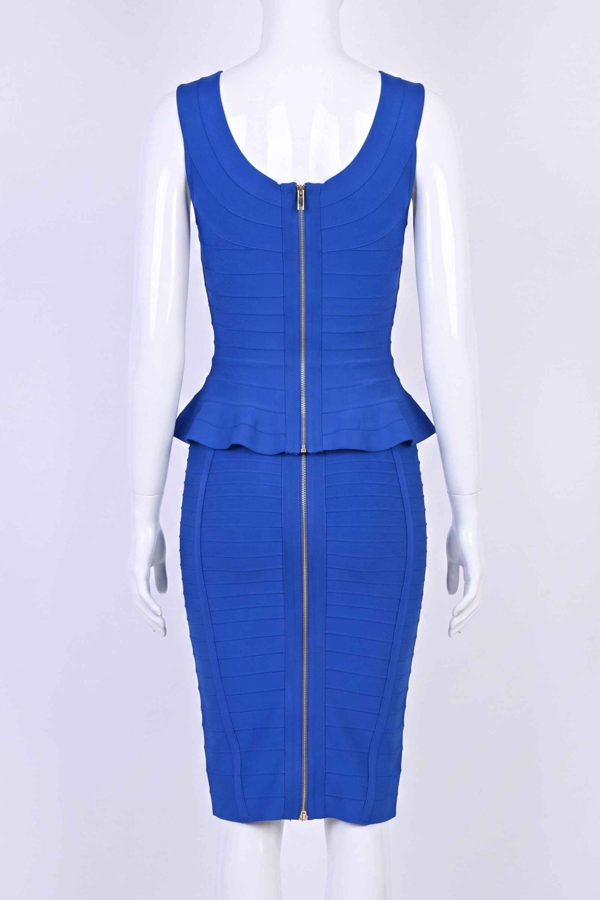 Woman wearing a figure flattering Leni Bandage Top - Royal Blue BODYCON COLLECTION