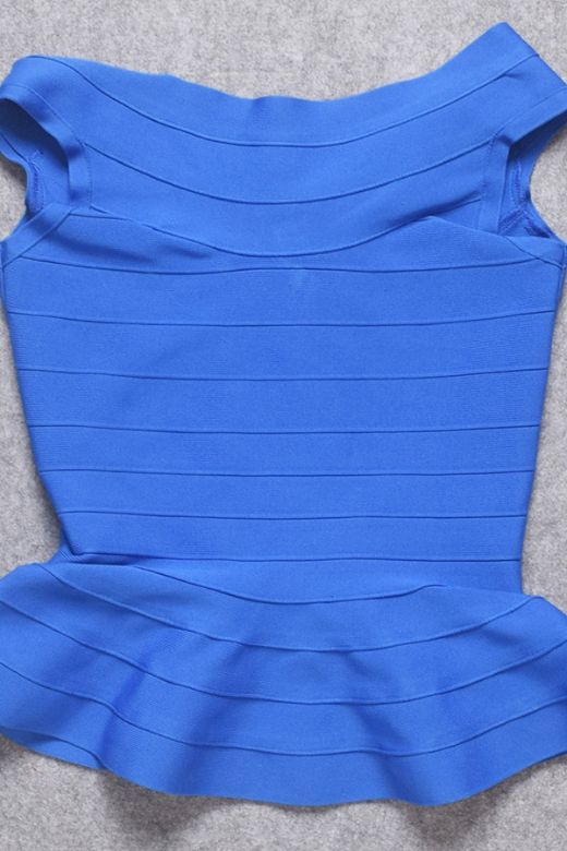 Woman wearing a figure flattering Leni Bandage Top - Royal Blue BODYCON COLLECTION