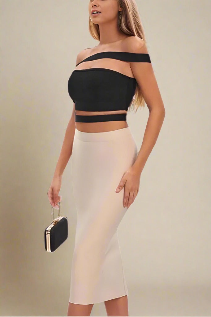 Woman wearing a figure flattering Lexia Bandage Top and Midi Skirt Set - Classic Black BODYCON COLLECTION
