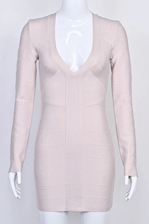 Woman wearing a figure flattering Lisa Long Sleeve Bandage Mini Dress - Cream BODYCON COLLECTION Pty Ltd