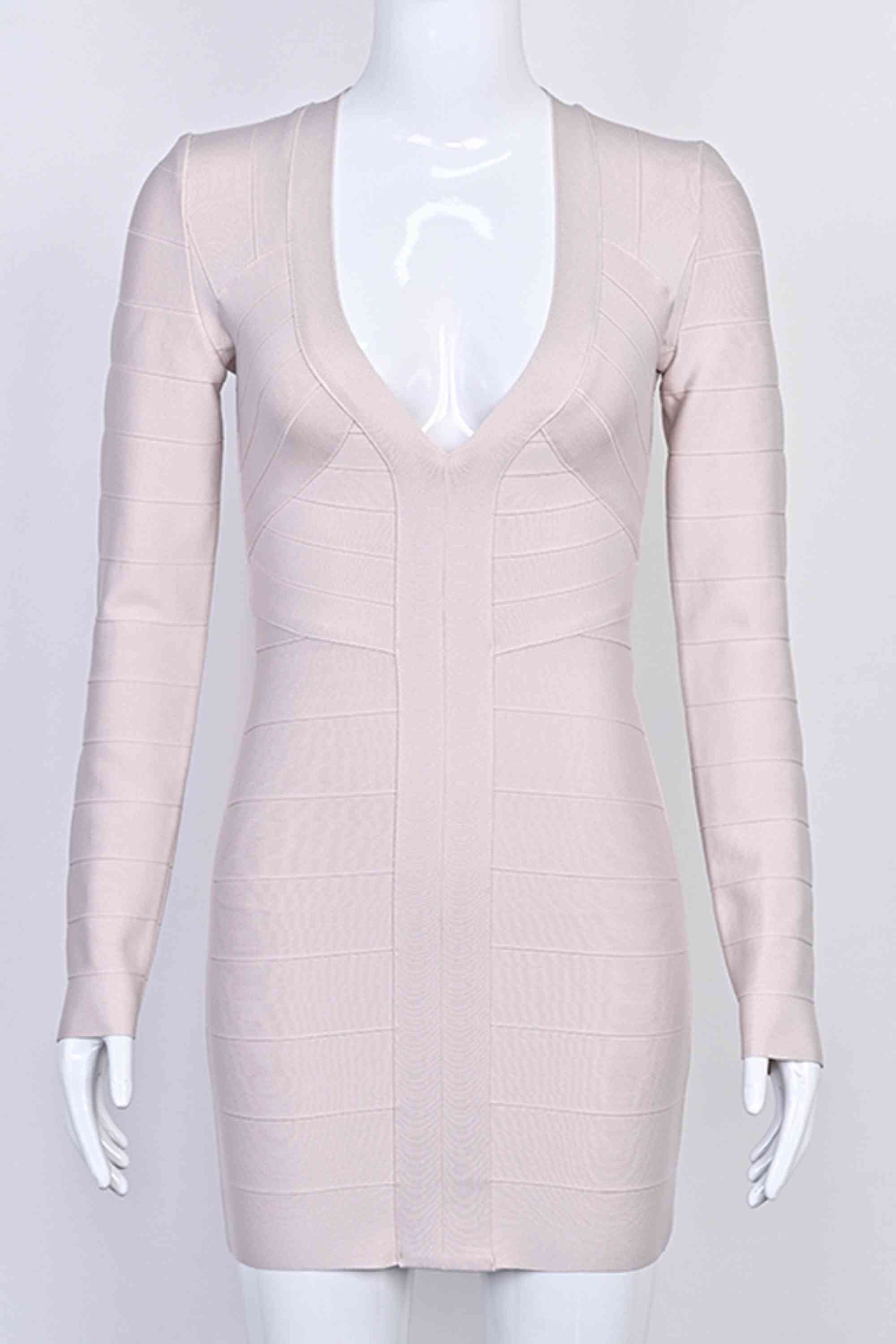 Woman wearing a figure flattering Lisa Long Sleeve Bandage Mini Dress - Cream BODYCON COLLECTION Pty Ltd