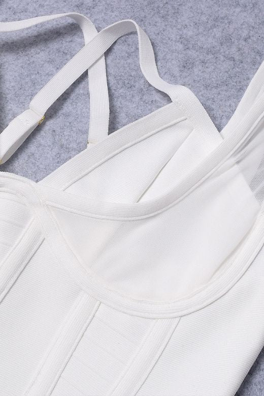 Woman wearing a figure flattering Lucy Bandage Midi Dress - White Pearl BODYCON COLLECTION