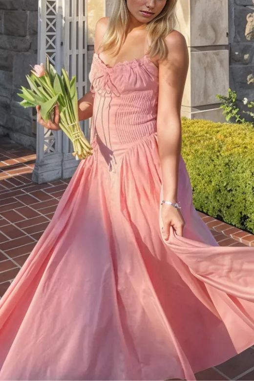 Woman wearing a figure flattering Lynsie Bodycon Midi Dress - Blush Pink BODYCON COLLECTION