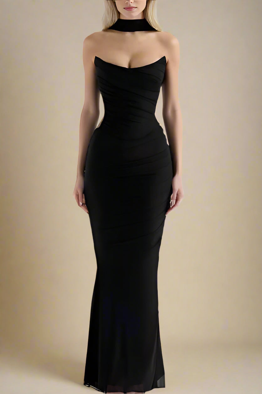 Woman wearing a figure flattering Margot Wrap Top and Maxi Skirt Outfit Set - Classic Black BODYCON COLLECTION