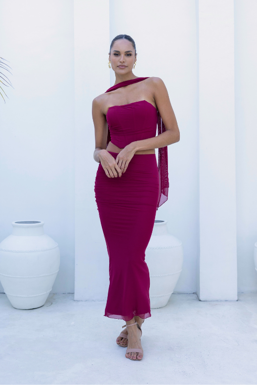 Woman wearing a figure flattering Margot Wrap Top and Maxi Skirt Outfit Set - Red Wine BODYCON COLLECTION