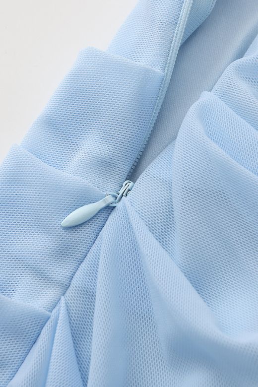 Woman wearing a figure flattering Margot Wrap Top and Maxi Skirt Outfit Set - Sky Blue BODYCON COLLECTION