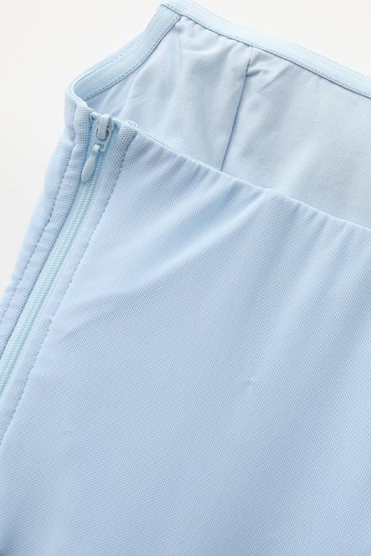 Woman wearing a figure flattering Margot Wrap Top and Maxi Skirt Outfit Set - Sky Blue BODYCON COLLECTION