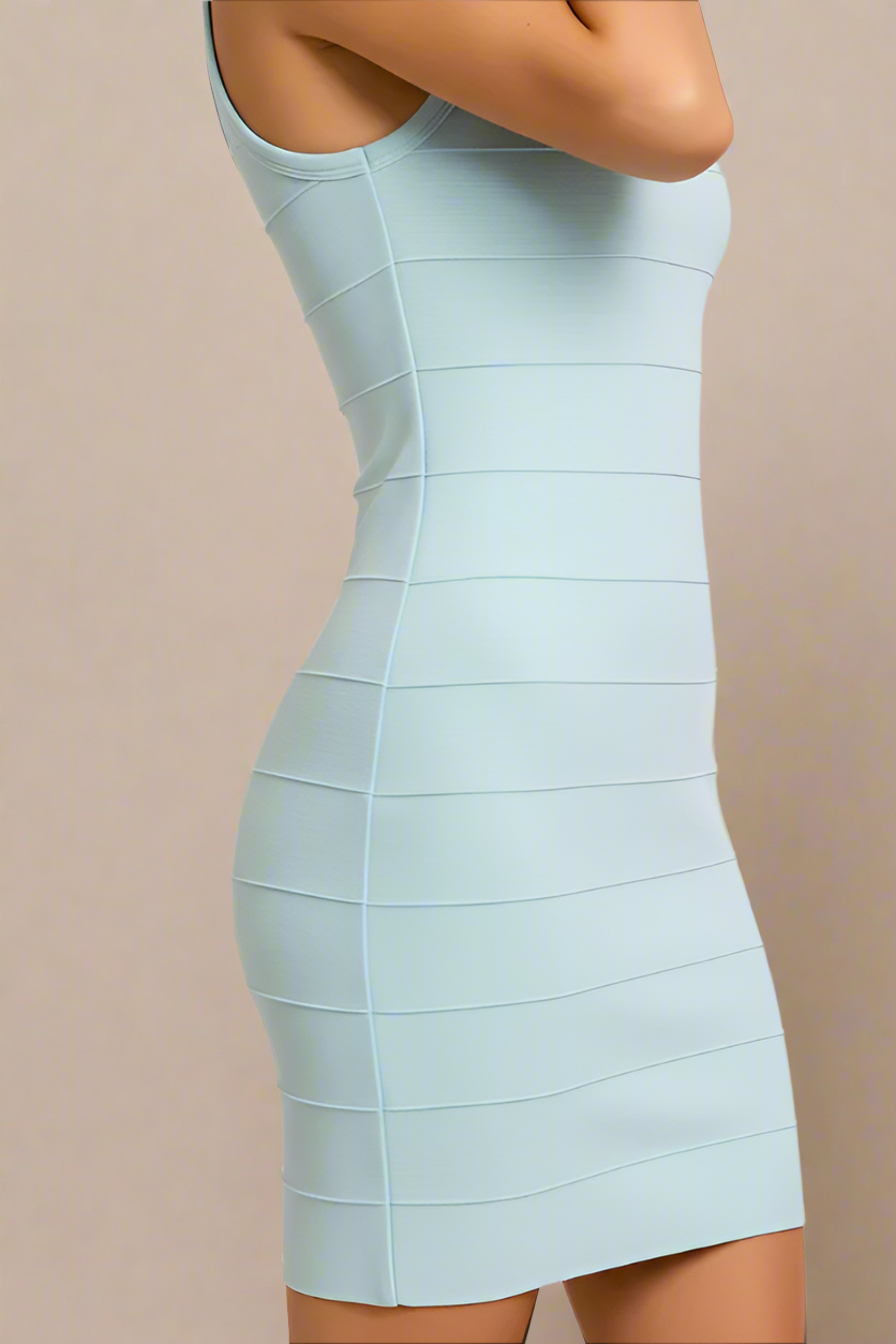 Woman wearing a figure flattering Maria Bandage Mini Dress - Baby Blue BODYCON COLLECTION