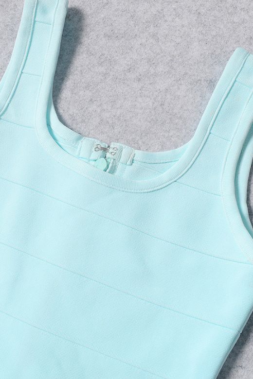 Woman wearing a figure flattering Maria Bandage Mini Dress - Baby Blue BODYCON COLLECTION