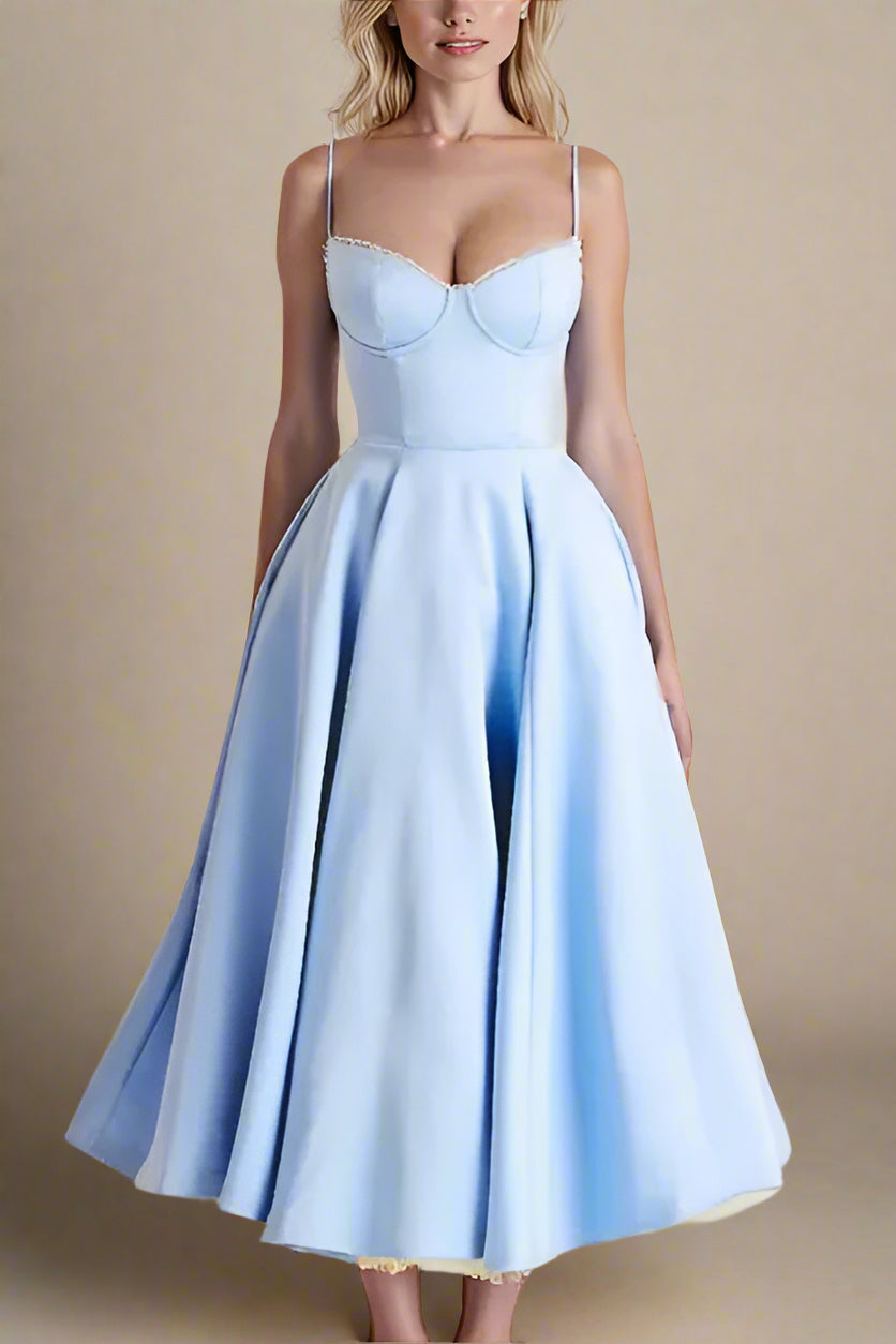 Woman wearing a figure flattering Mavis Bodycon Midi Dress - Baby Blue BODYCON COLLECTION