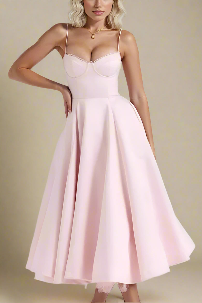 Woman wearing a figure flattering Mavis Bodycon Midi Dress - Dusty Pink BODYCON COLLECTION