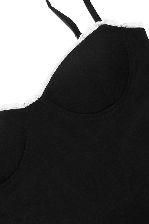 Woman wearing a figure flattering Mavis Bodycon Mini Dress - Classic Black BODYCON COLLECTION