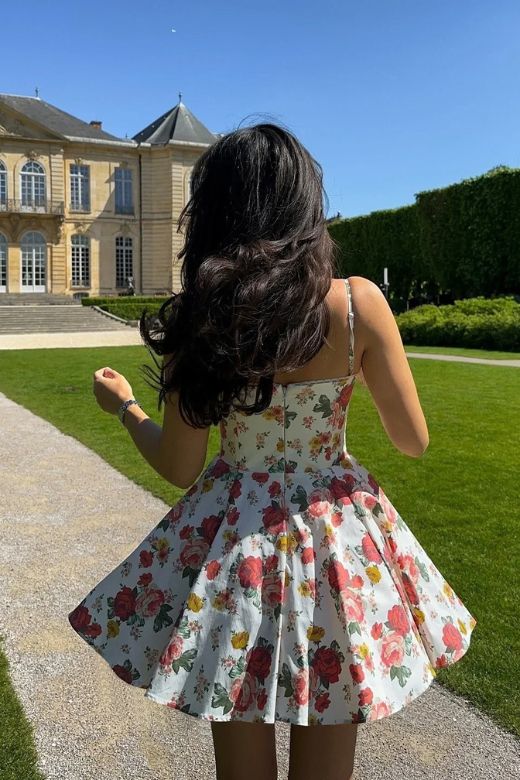 Woman wearing a figure flattering Mavis Bodycon Mini Dress - Cream BODYCON COLLECTION